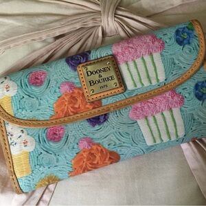 In search of blue Dooney and Bourke, cupcake wallet.